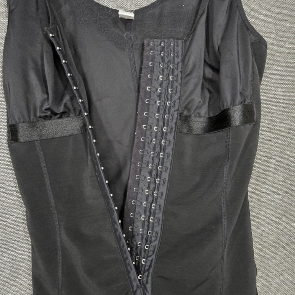 black firm compression‎ full-body shapewear bodysuit with a front hook-and-eye